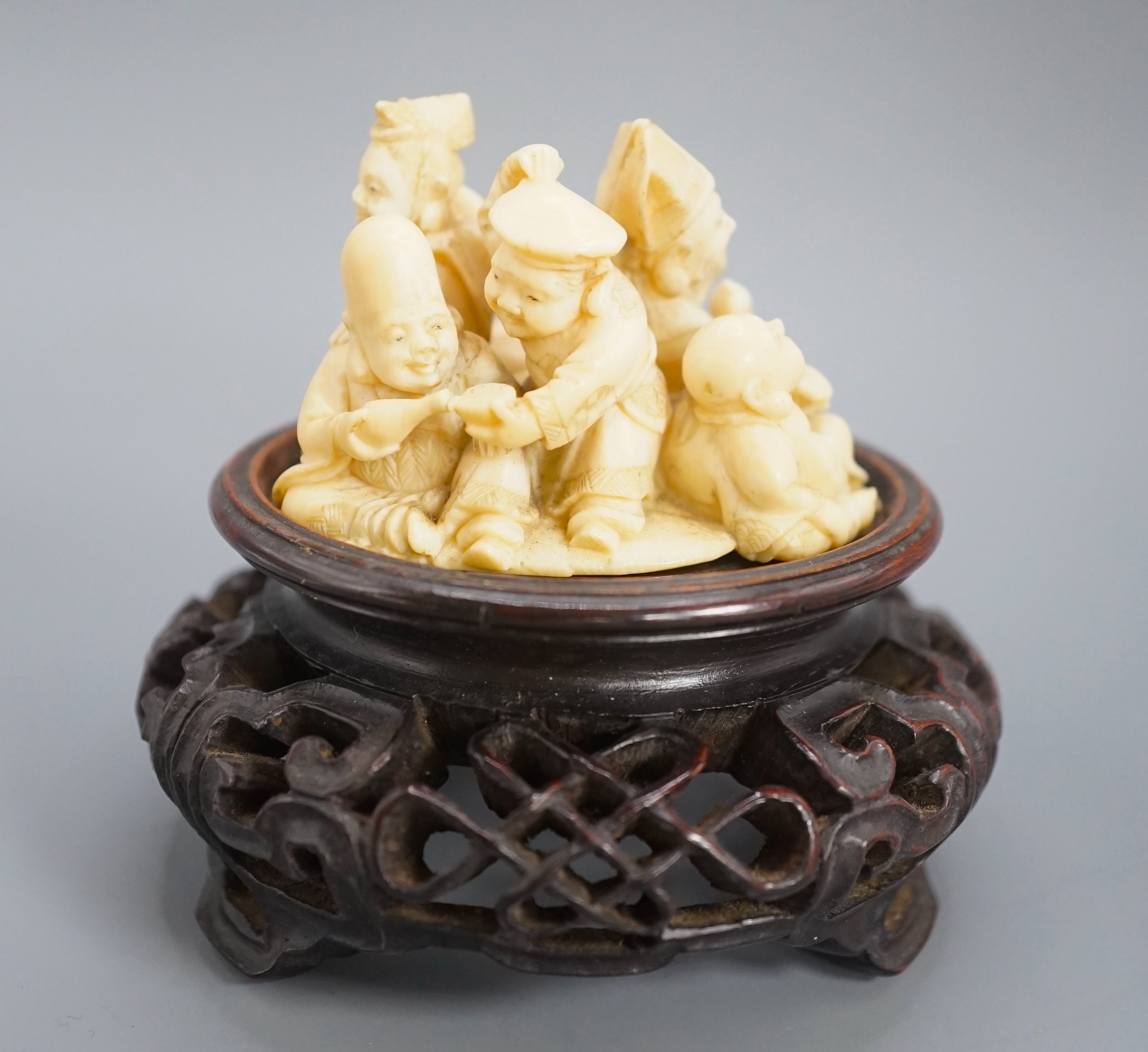 A Japanese ivory okimono of four of the Gods of Happiness, signed Gyokuzan, early 20th century, 6cm